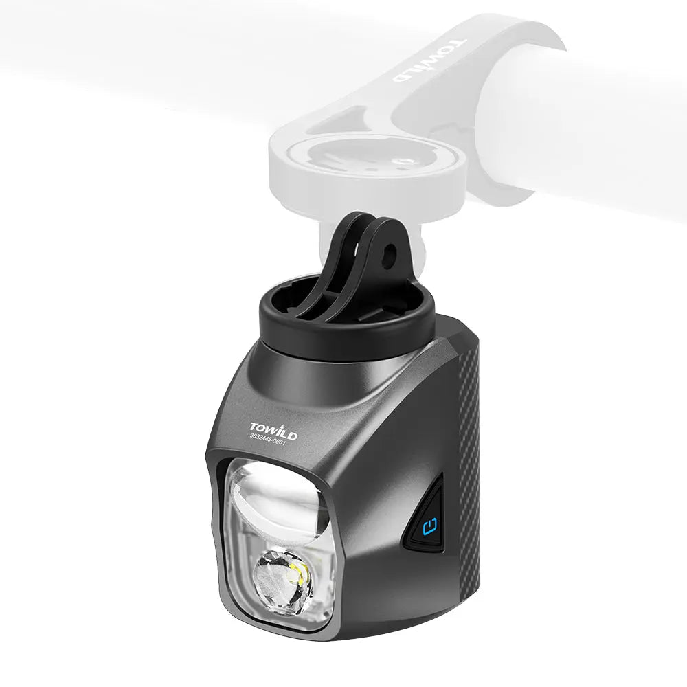 The black Towild DLite1700 bike light with its GoPro-compatible mount, ready for versatile underslung installation on out-front mounts.