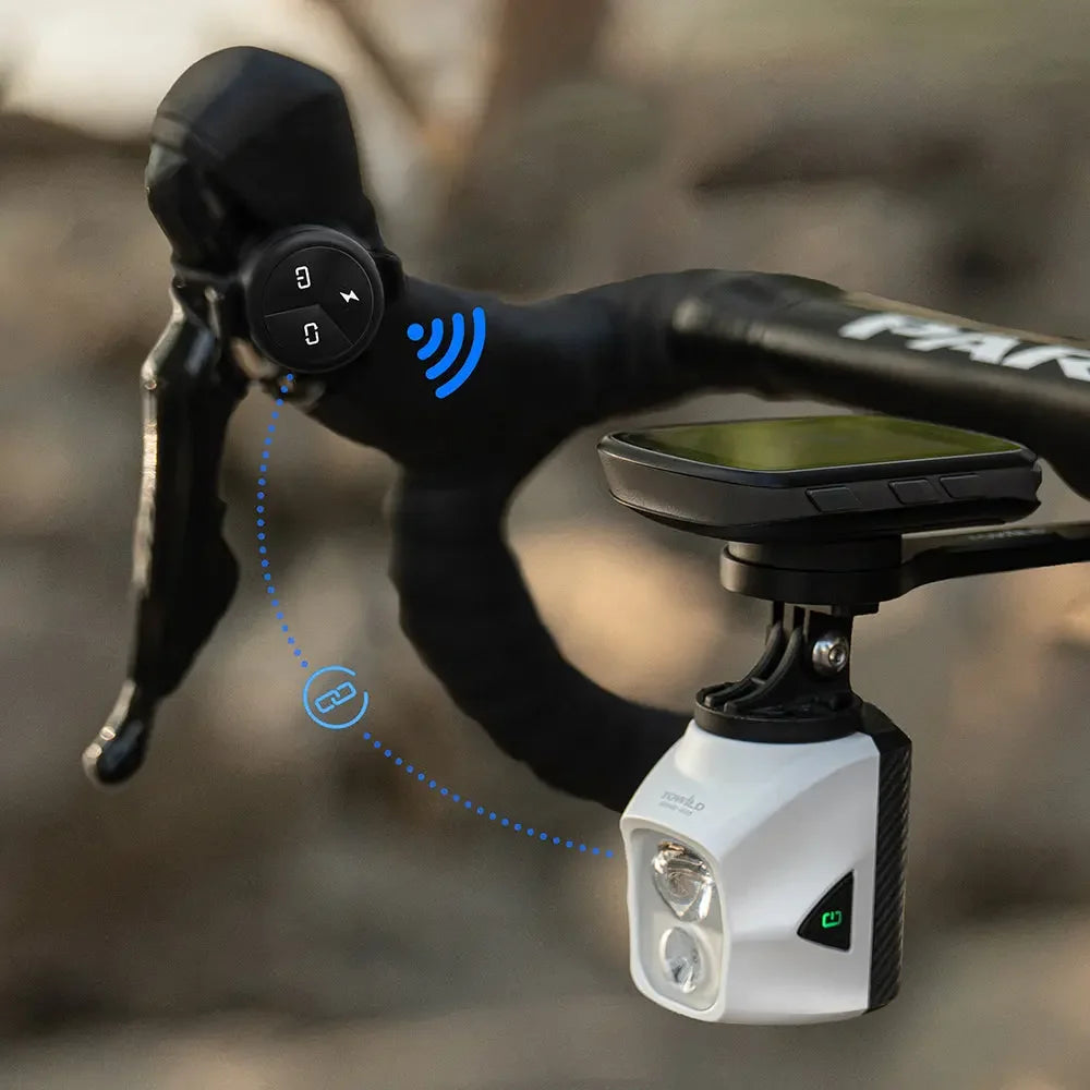 A diagram illustrating the wireless connection between the handlebar-mounted TOWILD ALC-01 remote and a DL series dual beam bike light.