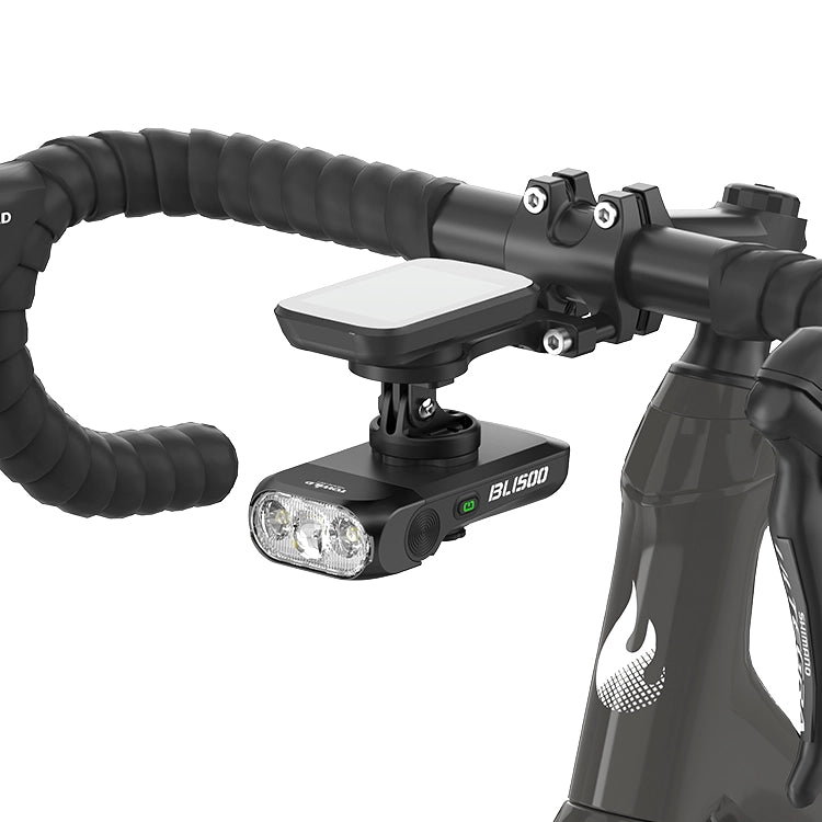 TOWILD BL1500 mounted below a bike computer on an out-front road-bike extension mount.