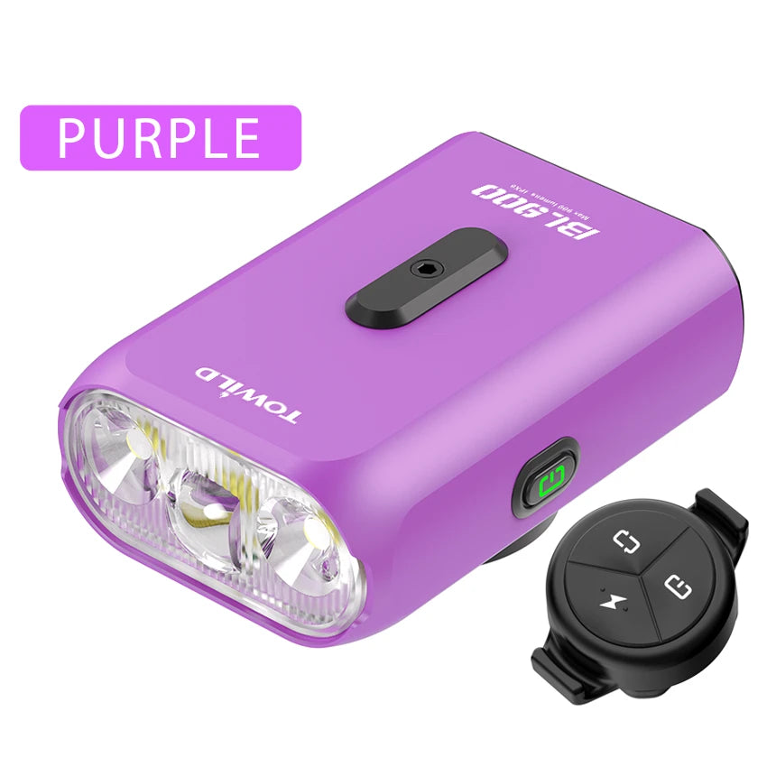 TOWILD BL900 purple road bike light set, complete with handlebar wireless remote controller and cut-off flood beam for night riding.