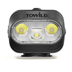 Front view of TOWILD BLMINI bike light showing dual focus and anti-glare flood beam optics