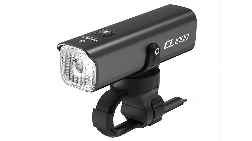 TOWILD CL1000 1000 lumen road cycling headlight installed on top of the handlebar with a quick-release strap.