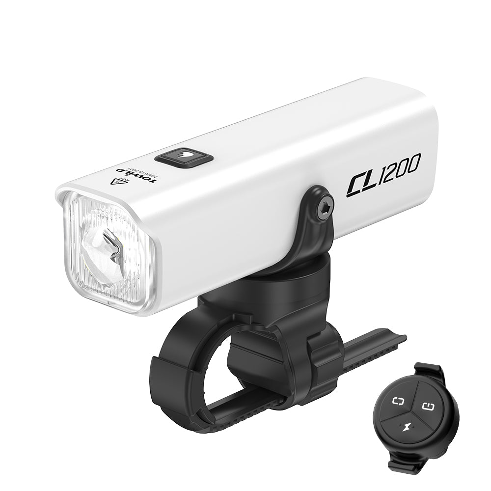 The white version of the TOWILD CL1200 smart bike light displayed with the compatible ALC-01 wireless remote controller, showcasing its remote-ready capabilities.
