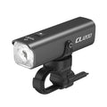 A studio shot of the black TOWILD CL1200 smart endurance bike light, showcasing its sleek aluminum body, anti-glare lens, and the included handlebar mount.