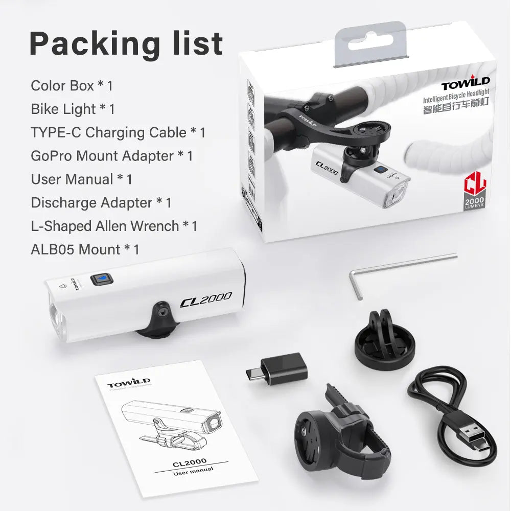 The complete package contents of the Towild CL2000 flagship bike light kit, showing the light, its box, the ALB05 mount, a GoPro adapter, and all charging/discharging accessories.