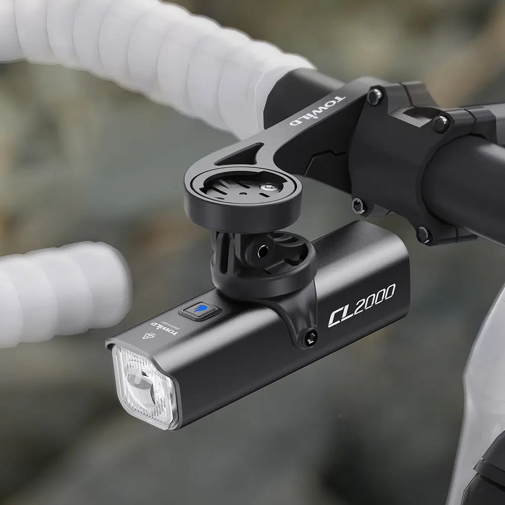 Achieving a clean and integrated cockpit by mounting the powerful Towild CL2000 headlight underneath an out-front mount, saving valuable handlebar space.