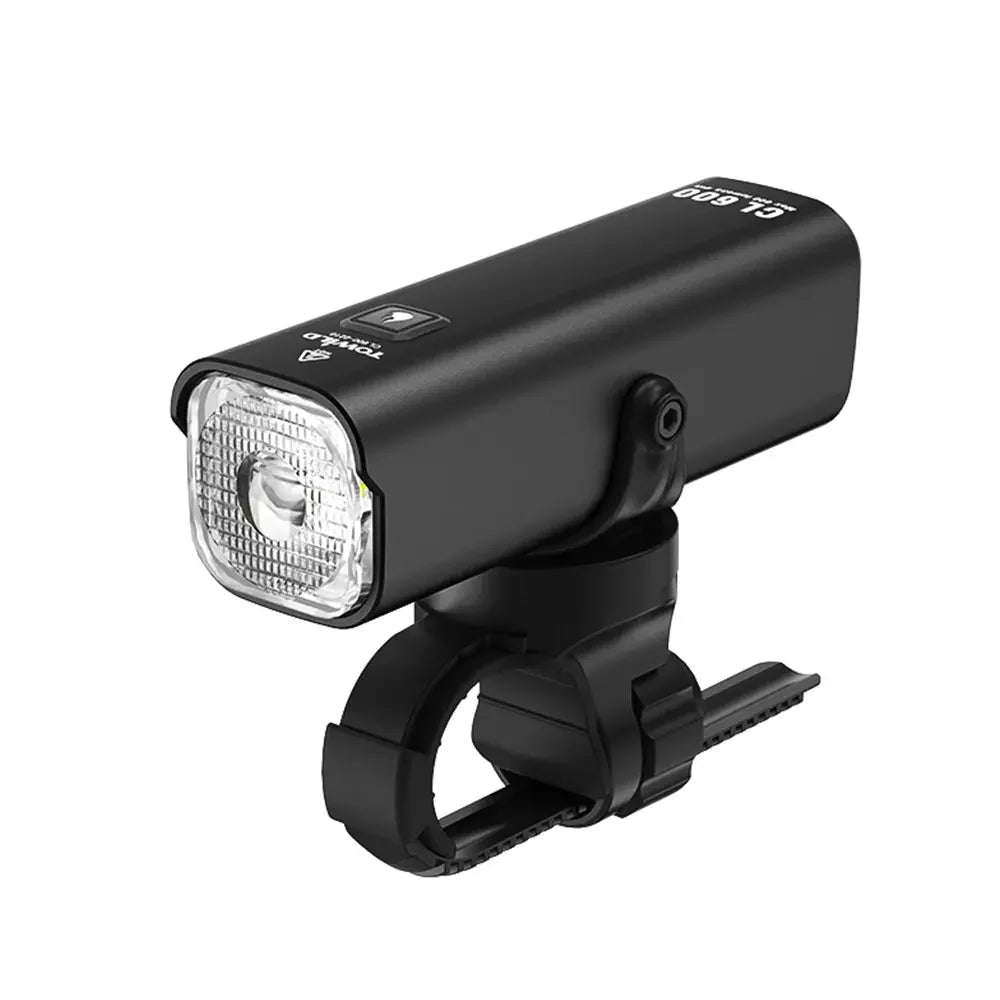 A studio shot of the black TOWILD CL600 smart commuter bike light, showing its StVZO-style anti-glare lens and the standard handlebar mount.
