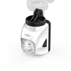 The white Towild DL1200S bike light shown with its included GoPro-compatible adapter, allowing for versatile underslung mounting on out-front mounts.
