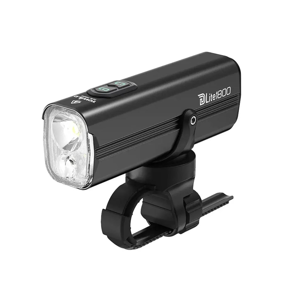 A front three-quarters view of the black TOWILD DLite1800 dual beam bike light, showing its two distinct lenses for flood and focus beams, attached to its standard handlebar mount.