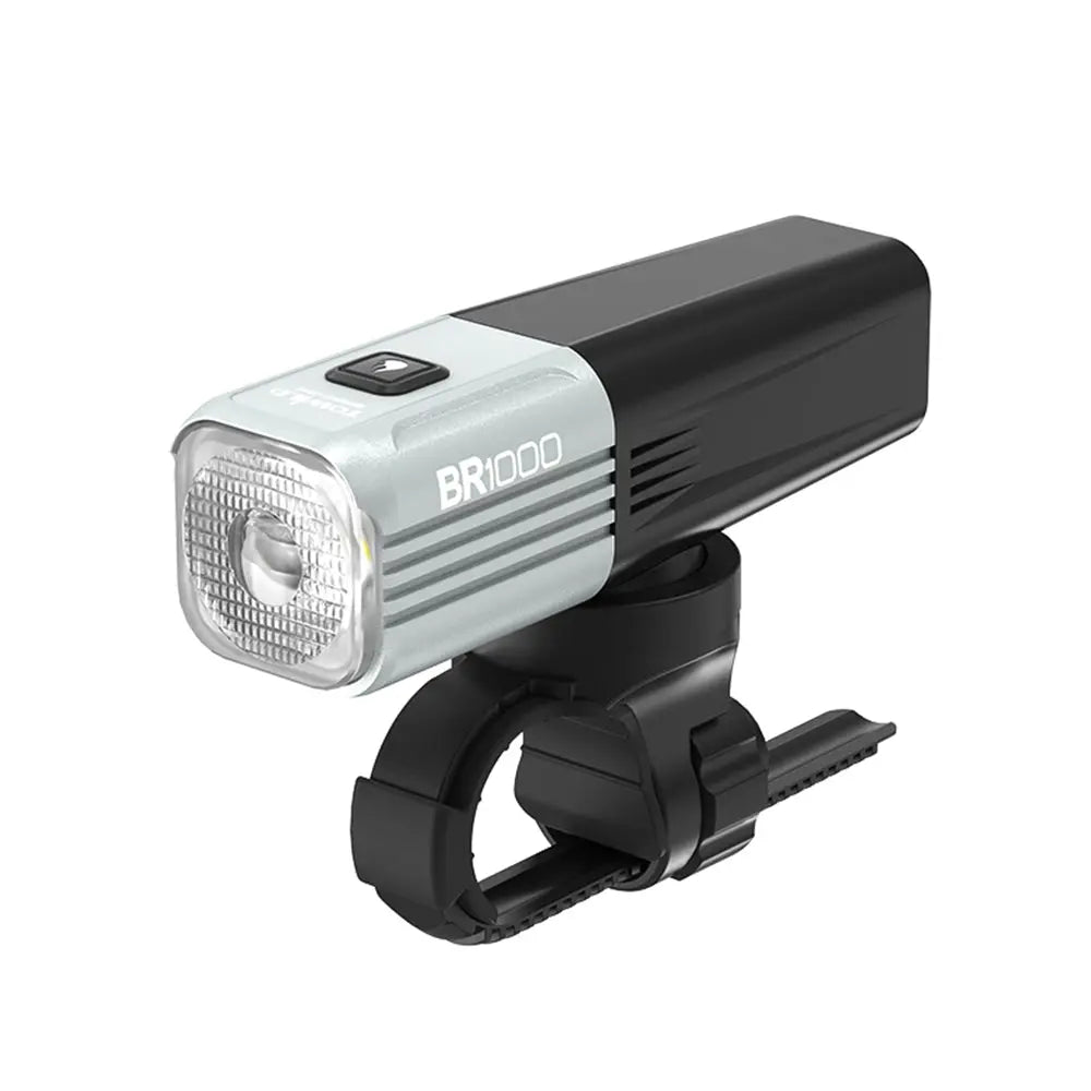 The grey Towild BR1000 lightweight bike light with a swappable battery, shown with its handlebar mount.