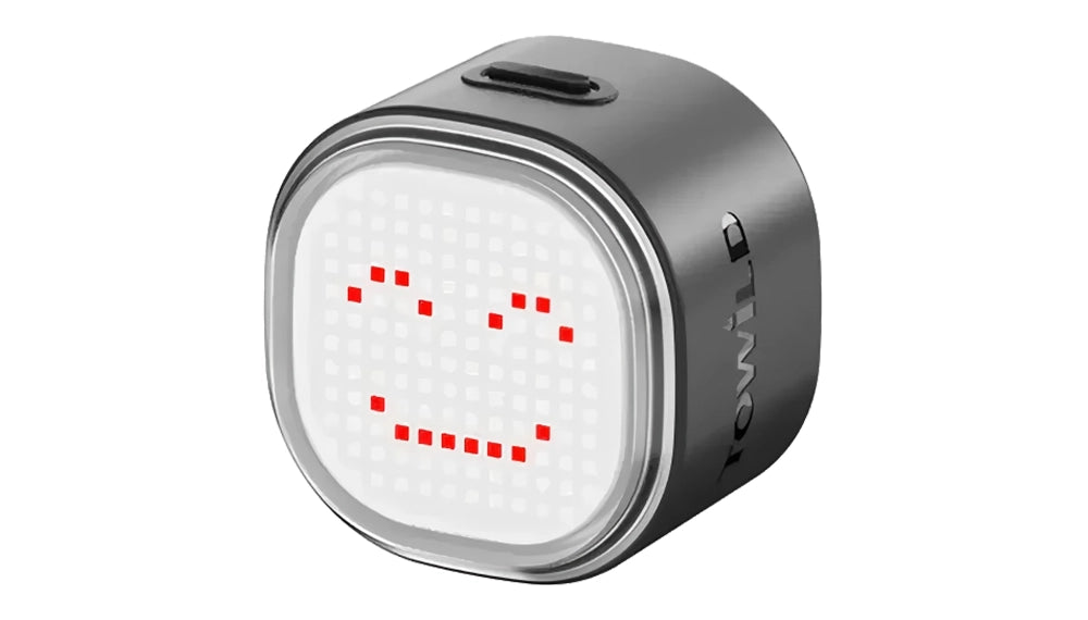 The innovative TOWILD TL08 smart tail light with a fully customizable pixel display, allowing riders to show custom emojis and animations via a mobile app.