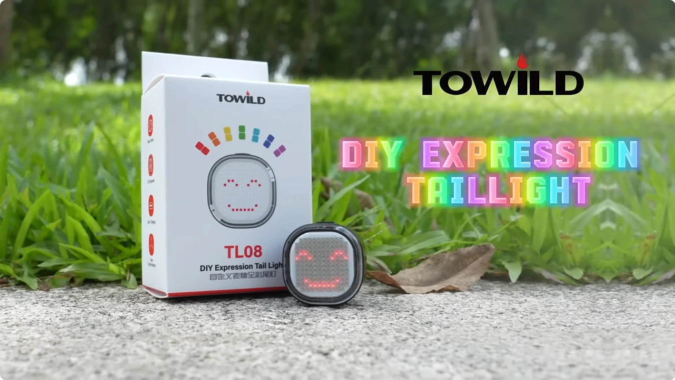 Video thumbnail for Towild TL08 smart tail light. Features the retail packaging and the device displaying a custom smiley face pixel art. Text overlay reads 'DIY EXPRESSION TAILLIGHT', highlighting its app-controlled customization features.