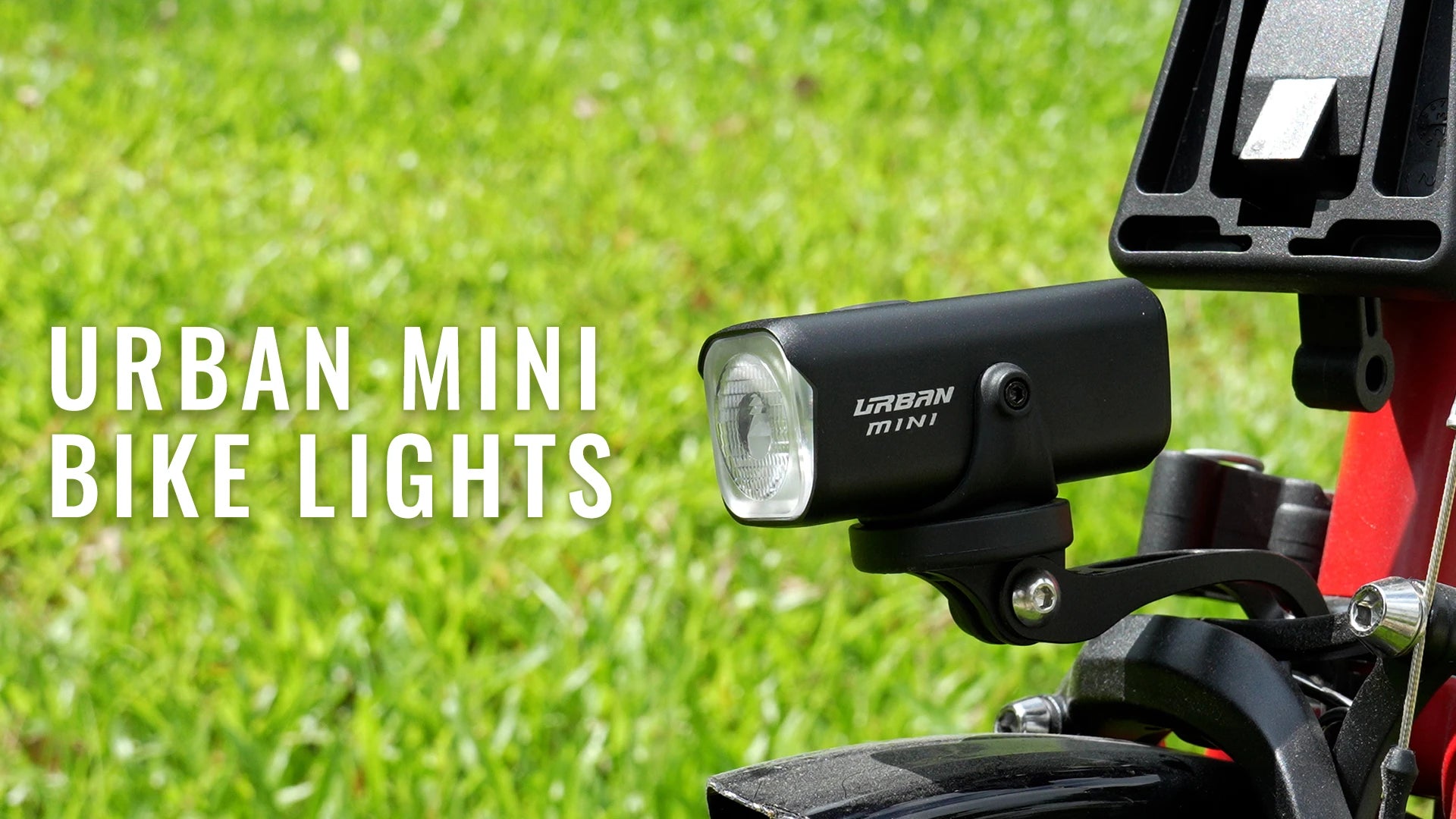 Video thumbnail for Towild Urban Mini smart bike light. Shows the compact light mounted on a Brompton fork using the specialized bracket, demonstrating a fold-friendly setup that doesn't interfere with the front luggage block.